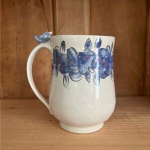Laura Burch signed pottery mug